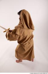 JOEL_ADAMSON STANDING POSE WITH SWORD